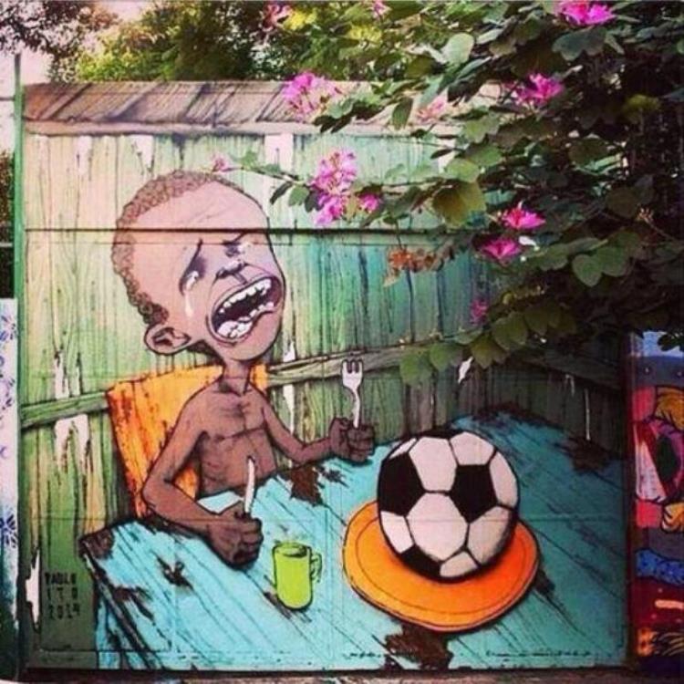 2014巴西世界杯遭遇街头涂鸦艺术家反讽抨击